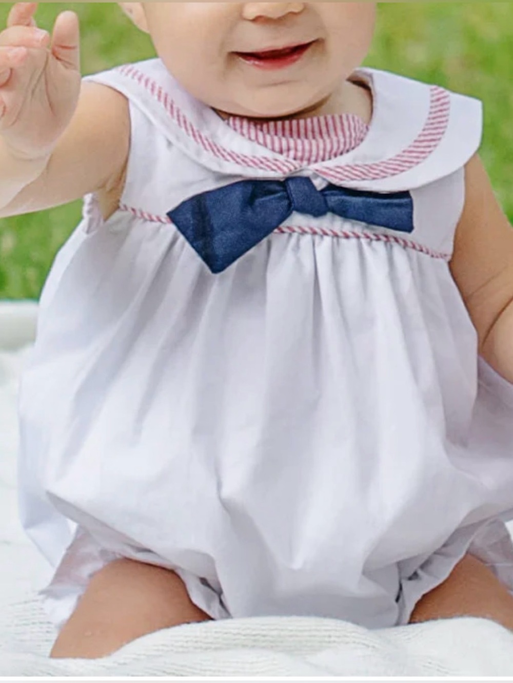 The Beaufort Bonnet Company White Baby Bubble with Red Striped Trim and Navy Bow